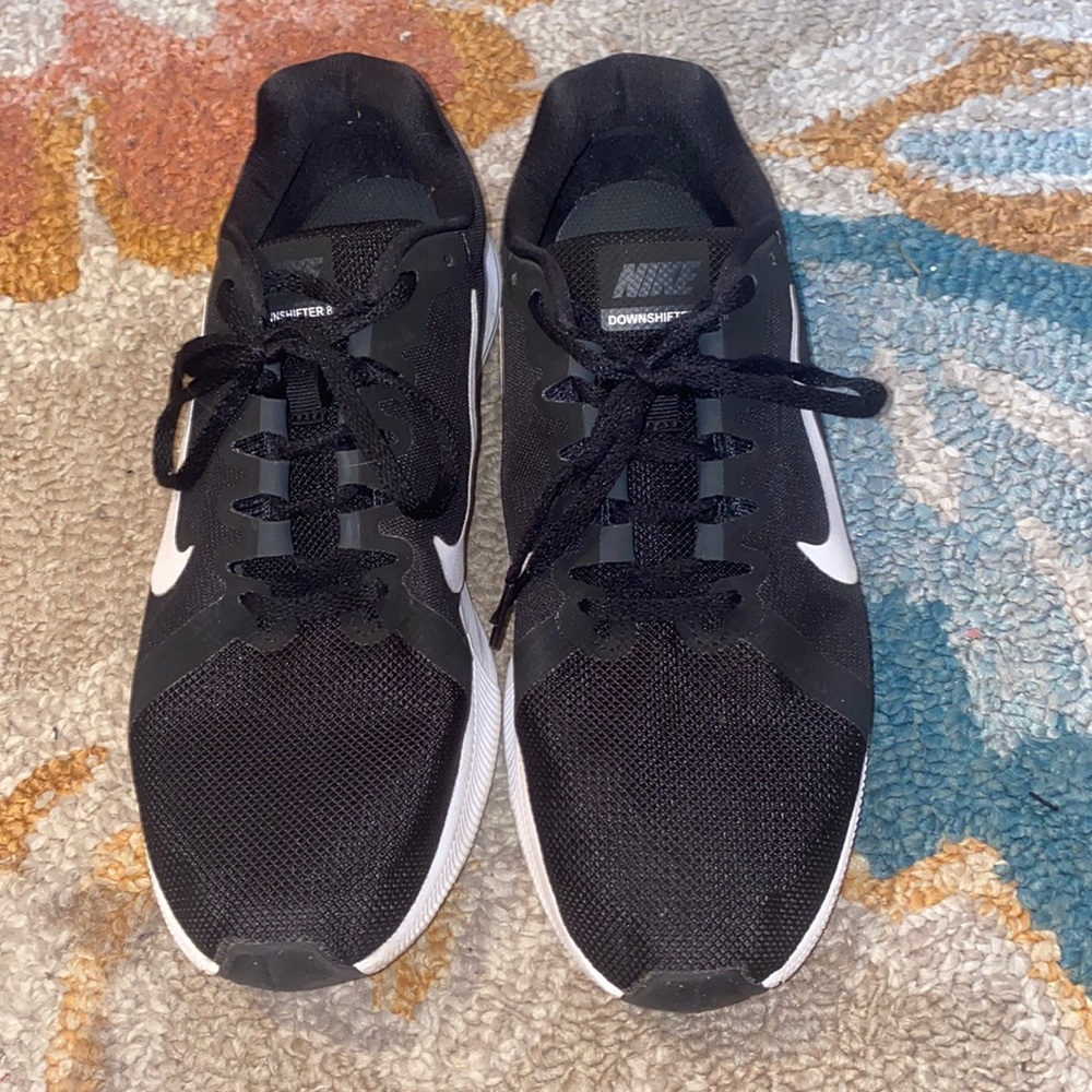 Black Nike downshifted 8 shoes